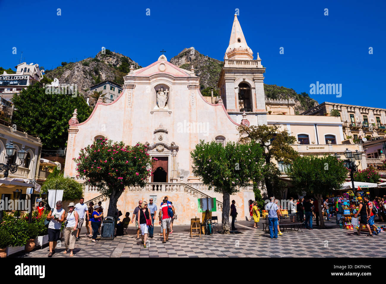 Tourists visiting Church of St. Joseph in Piazza IX Aprile on Corso Umberto, the main street in Taormina, Sicily, Italy, Europe Stock Photo