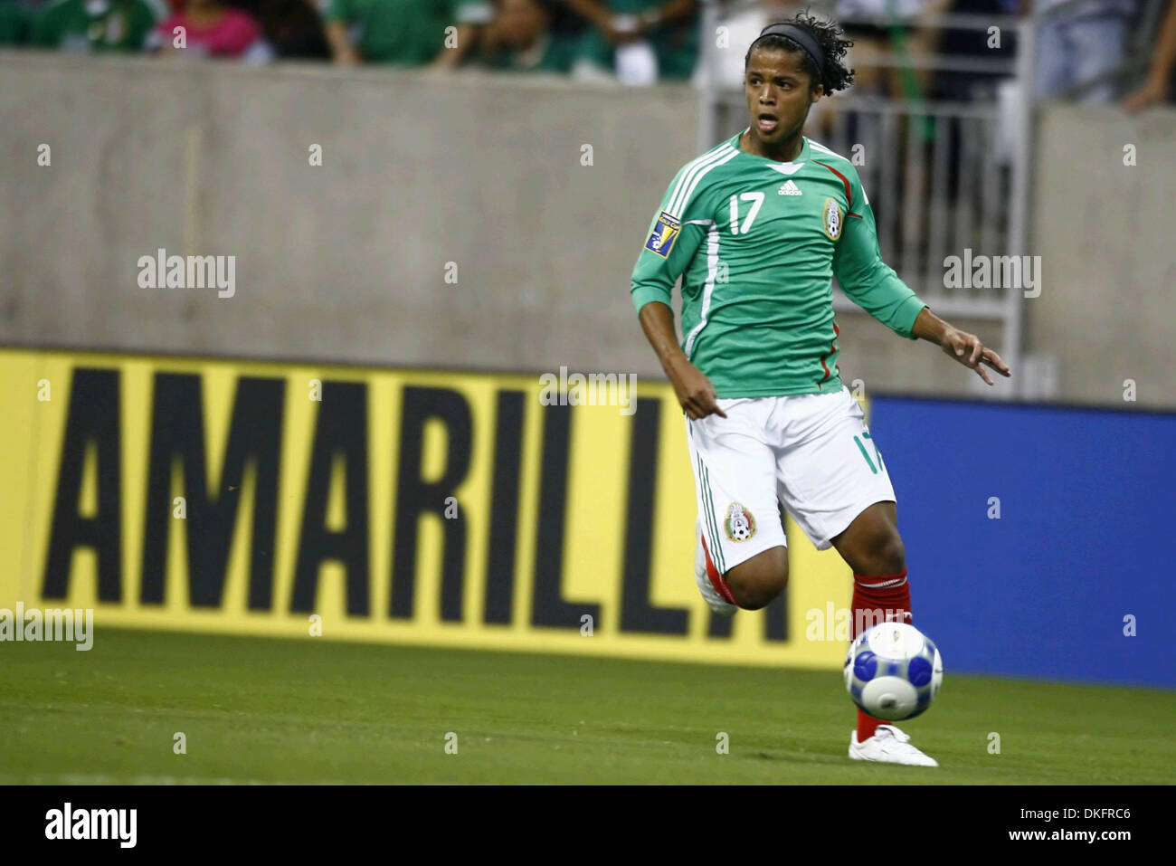 GIOVANI DOS SANTOS (#17) of Mexico breaks down the left side the left side before passing to MIGUEL SABAH (#14) of Mexico who scores on the play.  Panama and Mexico tied 1-1 at Reliant Stadium. Stock Photo