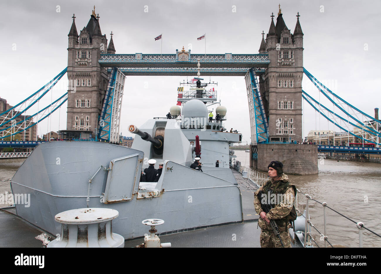 The last Type 42 destroyer HMS Edinburgh and Tower Bridge, London. Stock Photo