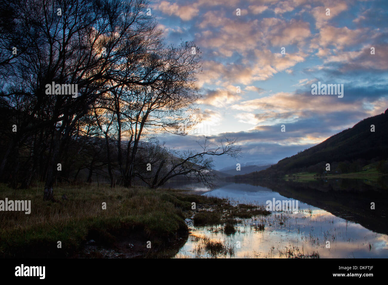 Loch Voil at dawn, in the Loch Lomond and Trossachs National Park in Scotland Stock Photo