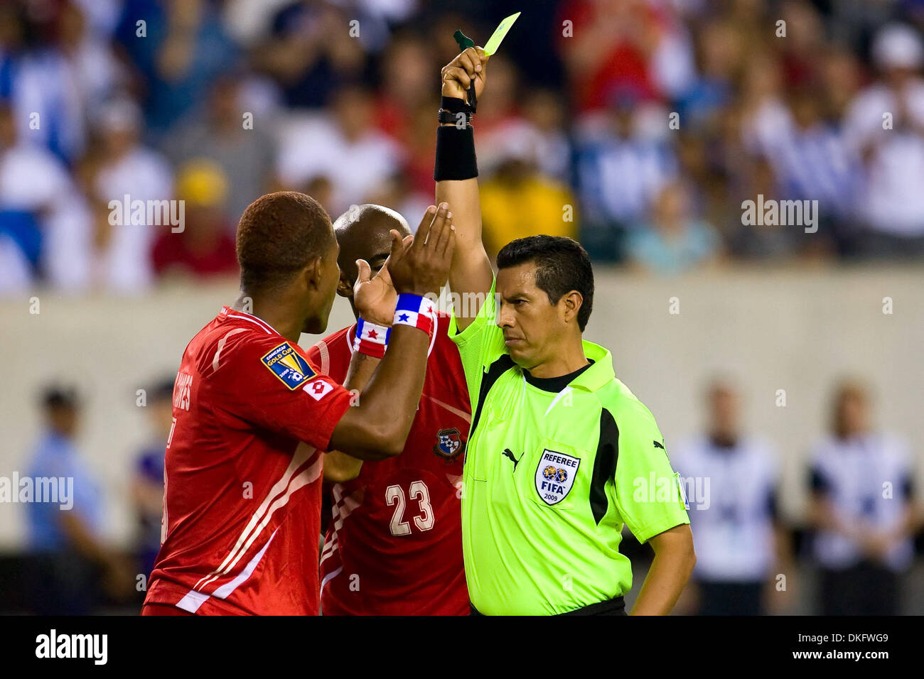 Jul 18, 2009 - Philadelphia, Pennsylvania, USA - ROMAN TORRES (5) pleads his case to Referee ARMANDO ARCHUNDIA to no avail for kicking United States' attacker KENNY COOPER (17), which will lead to a yellow card, a penalty kick, and the game winning goal, during the CONCACAF Gold Cup quarter finals match between United States and Panama at Lincoln Financial Field in Philadelphia, Pe Stock Photo