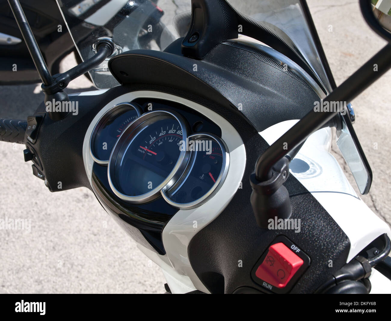 handlebar and speedometer on shiny modern scooter Stock Photo