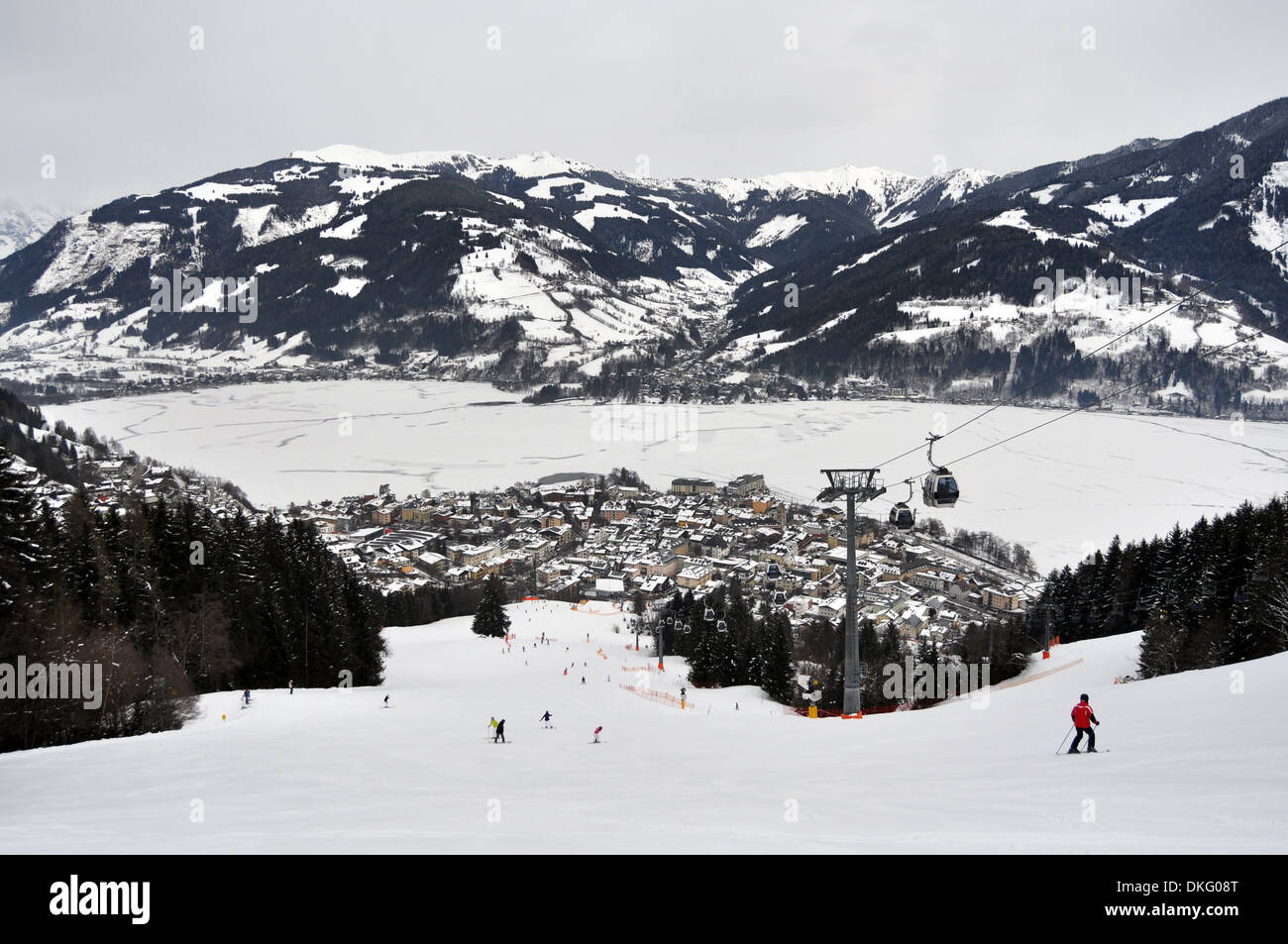 Skiing down towards the resort of Zell am See, Austria Stock Photo