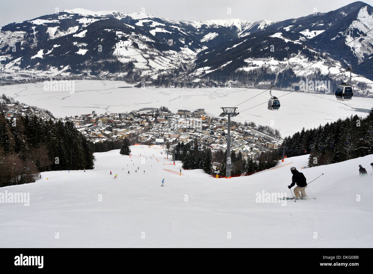 Skiing down towards the resort of Zell am See, Austria Stock Photo