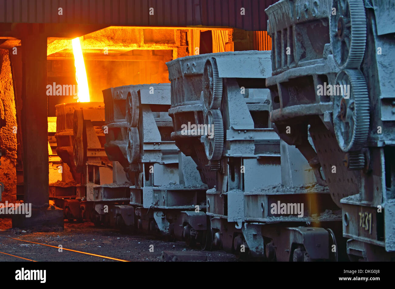 steel buckets to transport the molten metal inside of plant Stock Photo