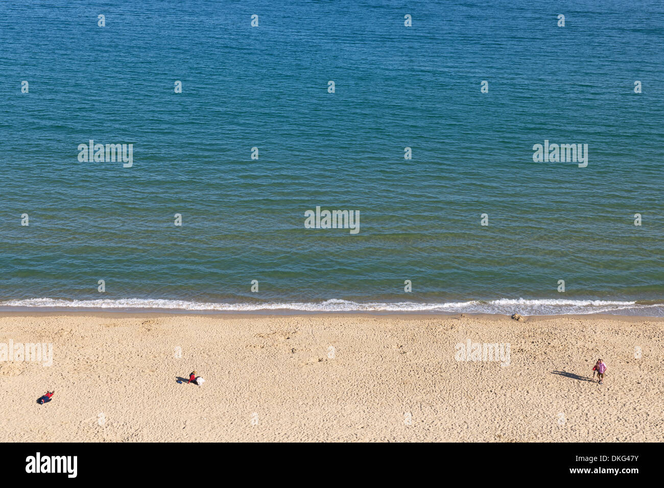 People on beach, Poole, Dorset, UK Stock Photo