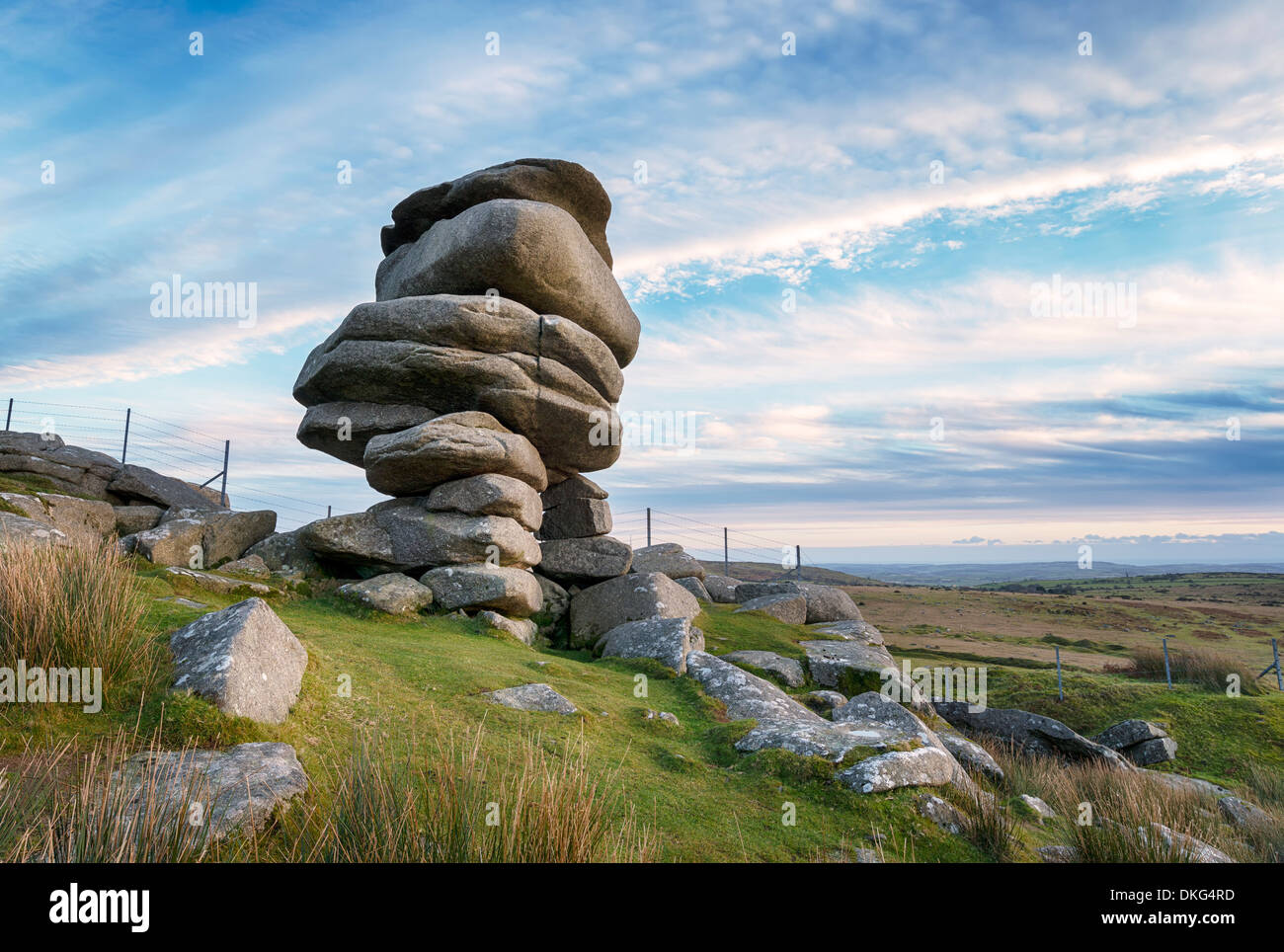 The Cheesewring a rocky outcrop of weathered granite slabs seemingly impossibly balanced on Bodmin Moor near the Minions Stock Photo