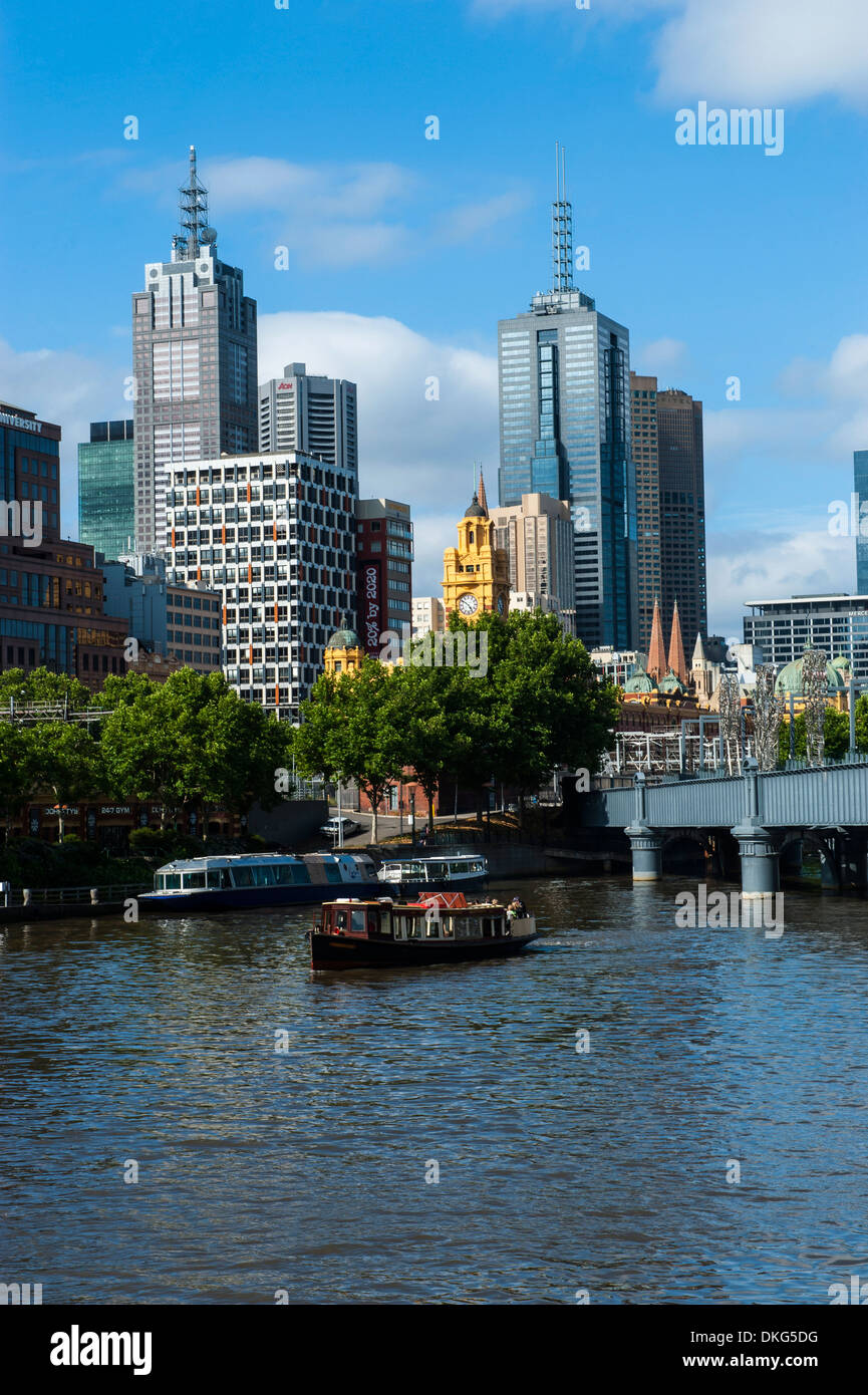 High rise buildings on the Yarra River flowing through Melbourne, Victoria, Australia, Pacific Stock Photo