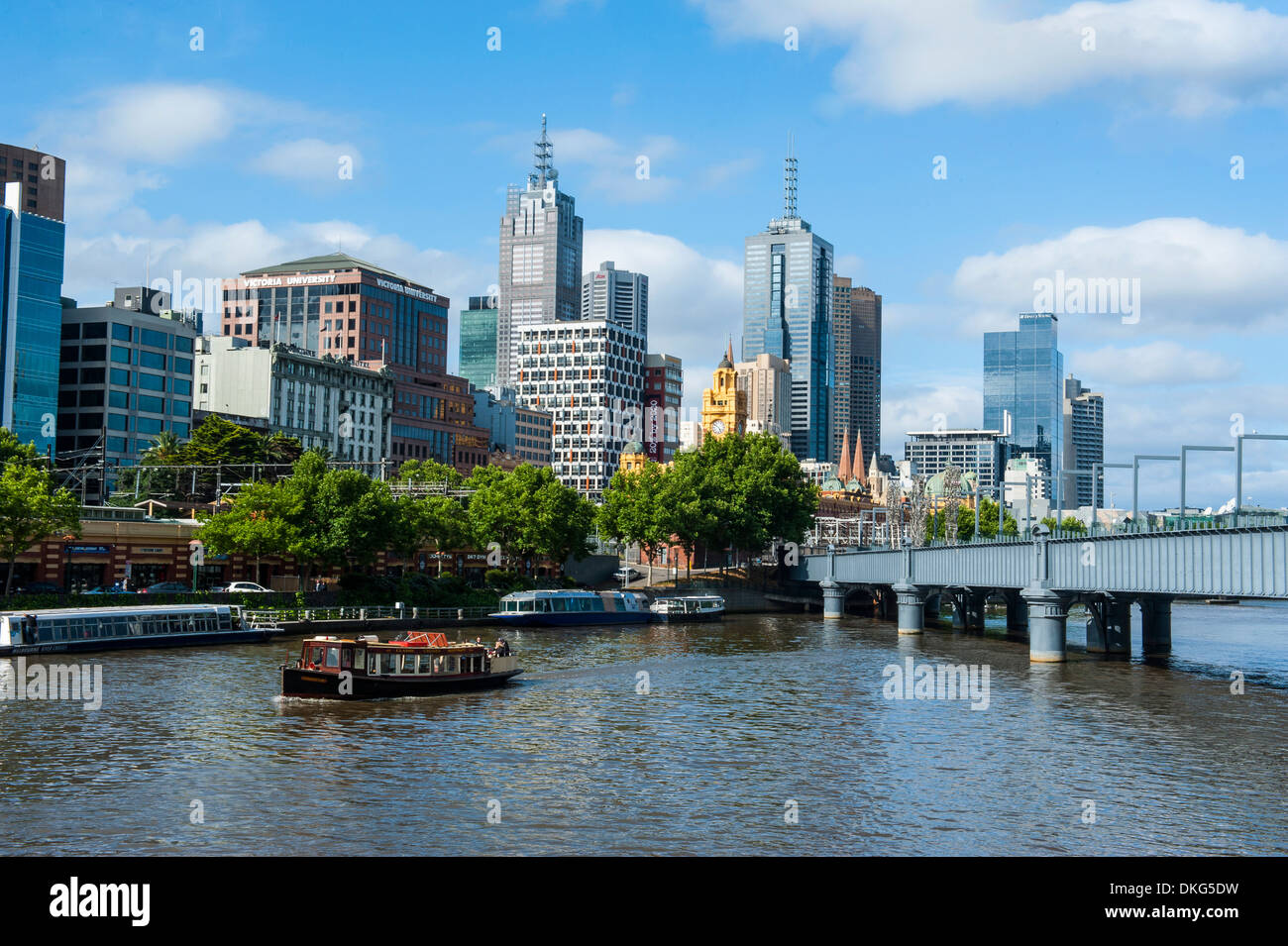 High rise buildings on the Yarra River flowing through Melbourne, Victoria, Australia, Pacific Stock Photo