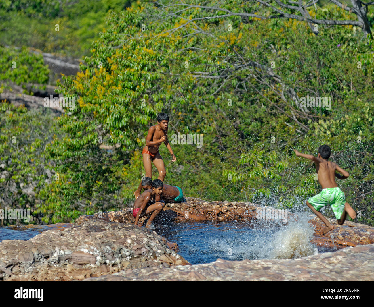 Chapada Diamantina, Lencois, Bahia, Brazil: Local children playing and swimming in one of many Rio Lencois' natural pools. Stock Photo