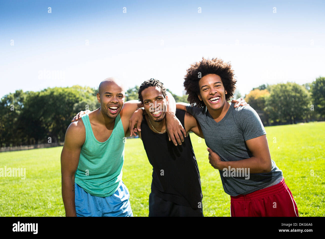 Portrait of three young men smiling Stock Photo