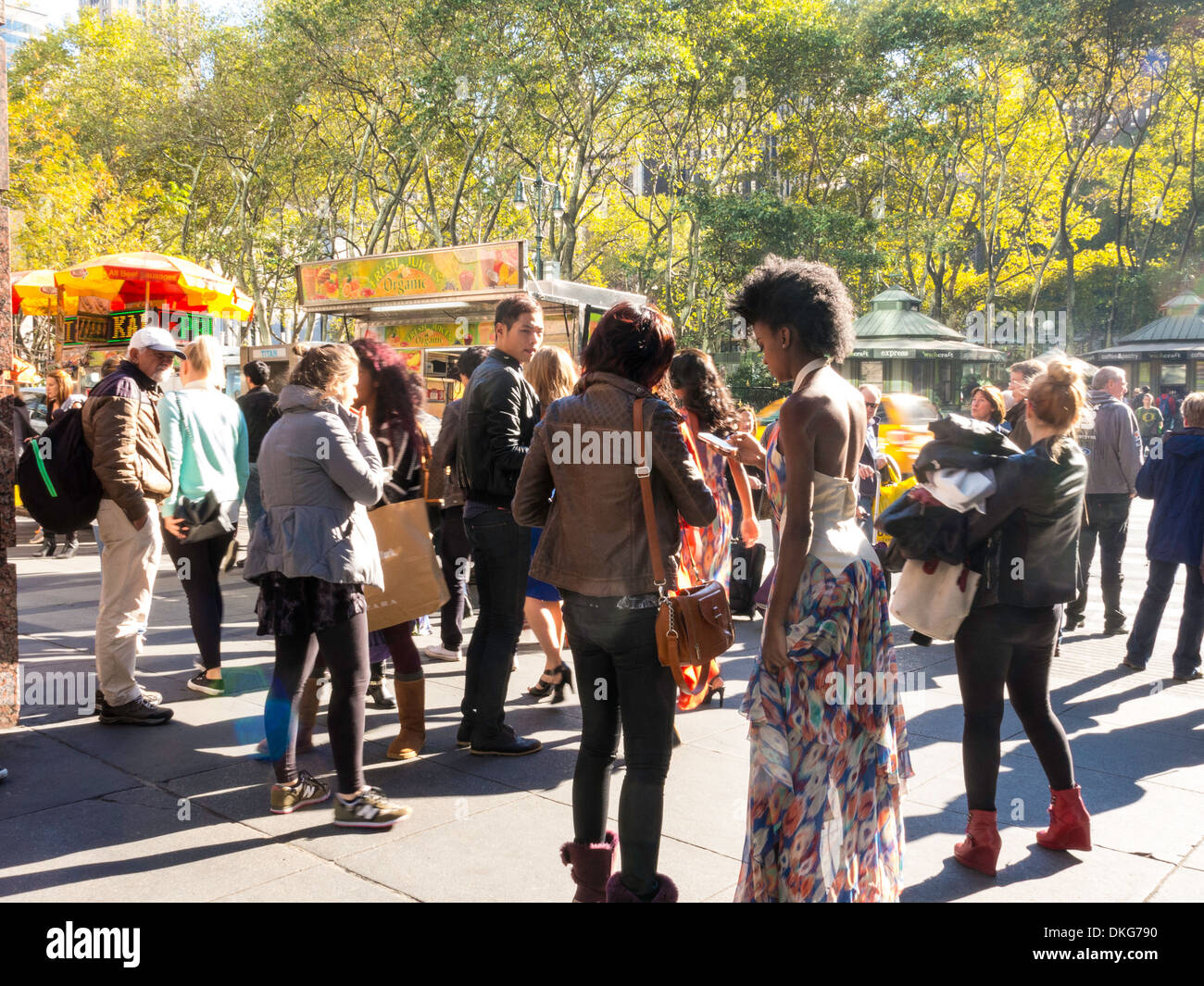 Female standing on sidewalk hi-res stock photography and images - Alamy