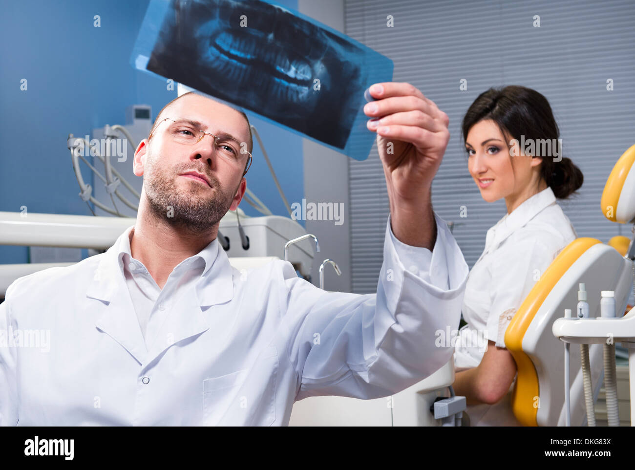 Dentist with xray Stock Photo Alamy