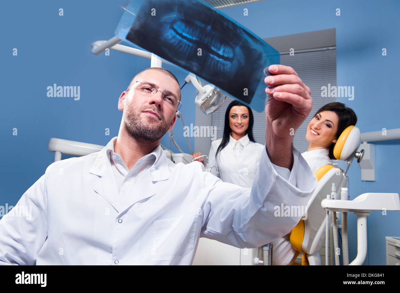 Dentist with xray Stock Photo Alamy