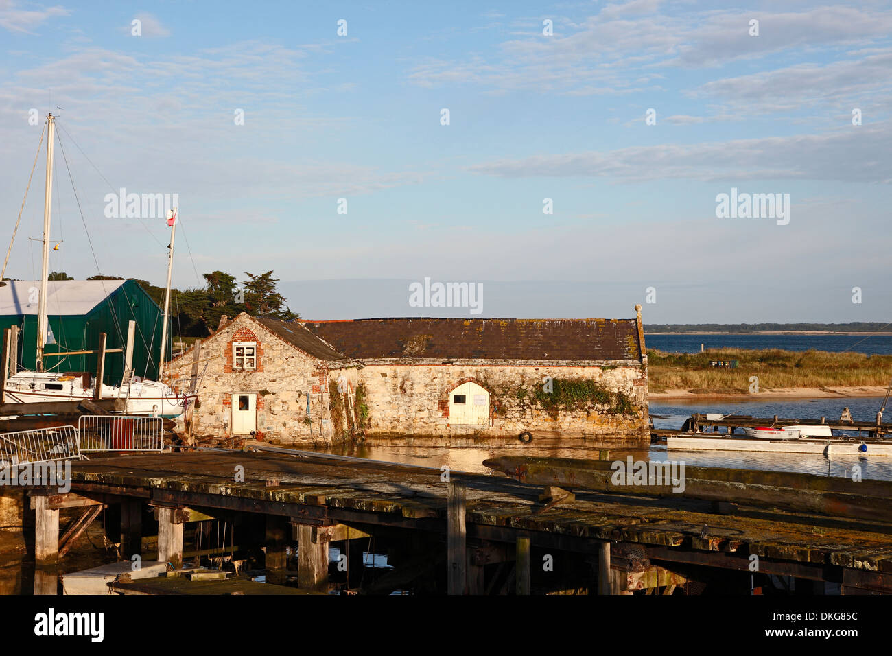 Boatyard building and landing stages Yarmouth Isle of Wight Hampshire England Stock Photo