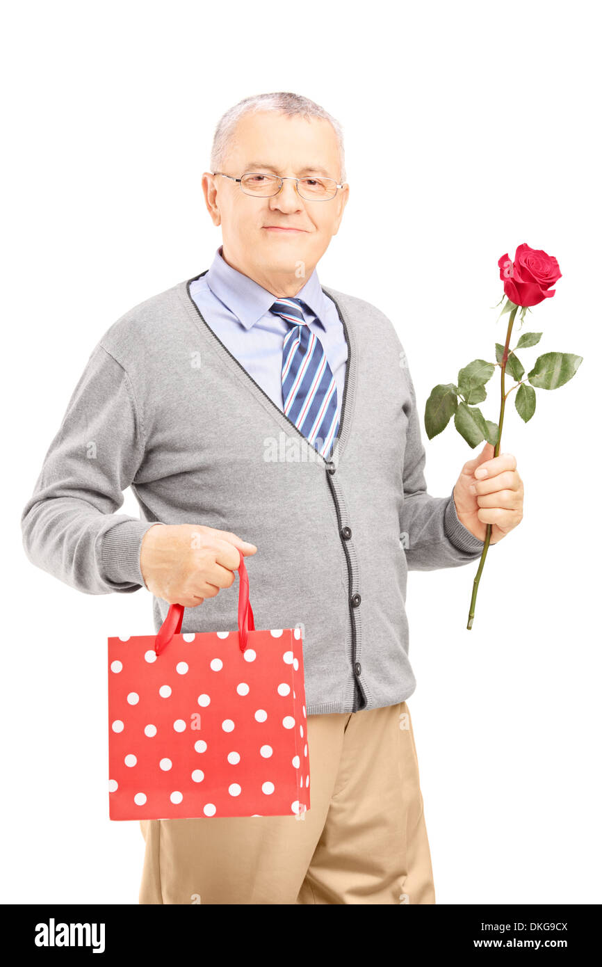 Mature gentleman holding rose flower Cut Out Stock Images & Pictures ...