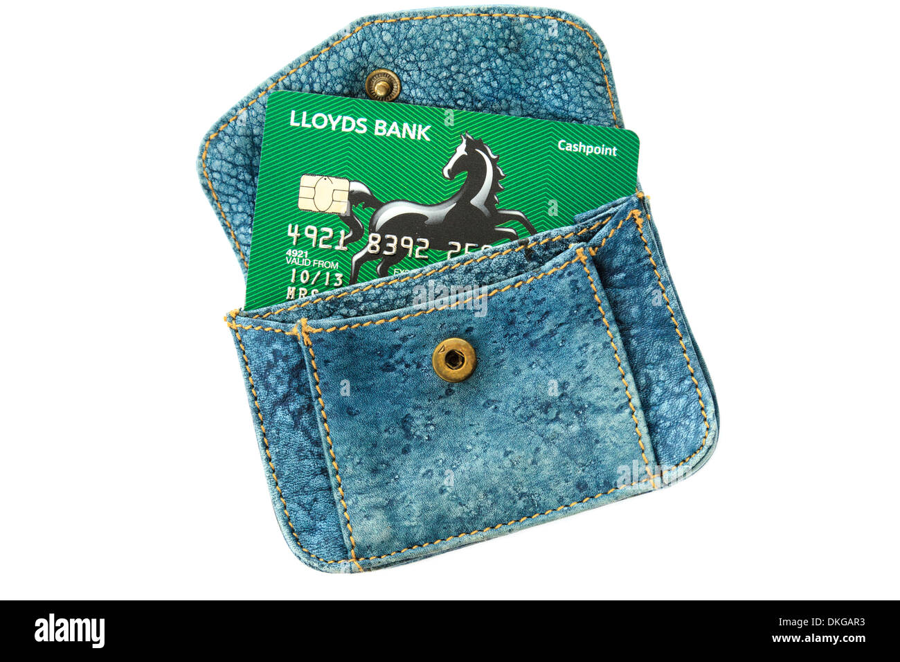 New Lloyds Bank cashpoint card in a blue purse isolated on a plain white background. England, UK, Britain Stock Photo