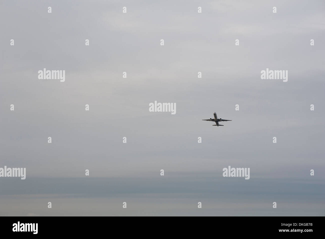 An airplane taking off from Logan Airport in Boston. Oct. 4, 2013 Stock Photo