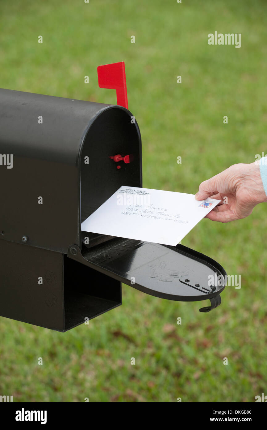 US mail box setting flag for letter collection Stock Photo Alamy