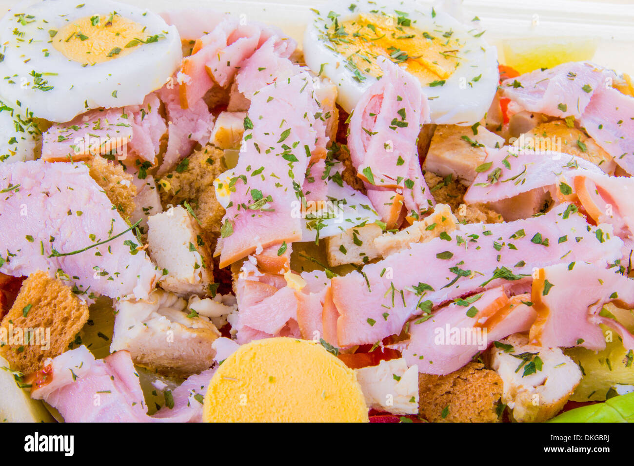 chicken salad with sirloin and eggs and bread cubes Stock Photo Alamy
