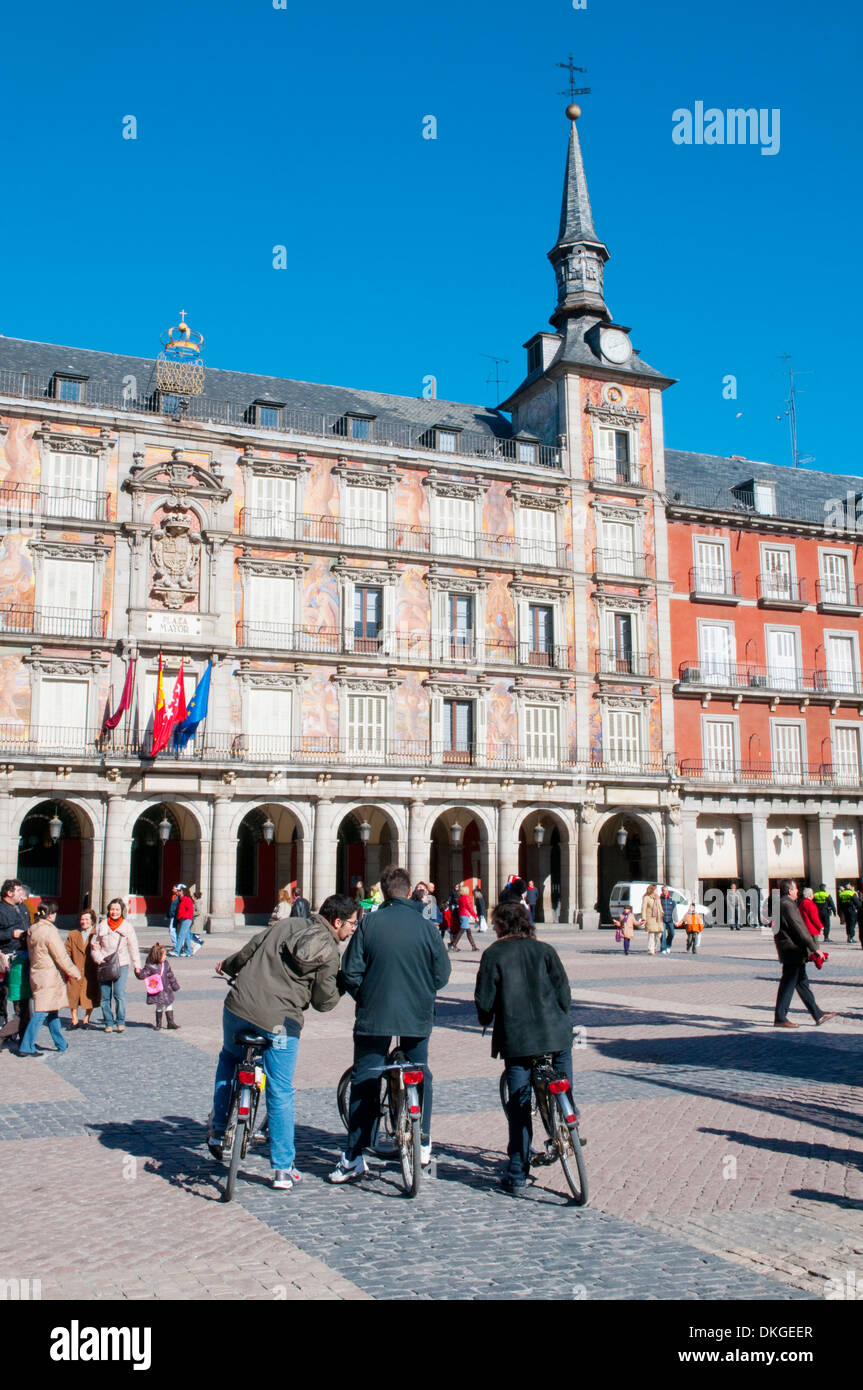 Tourists riding bikes at the Main Square. Madrid, Spain. Stock Photo
