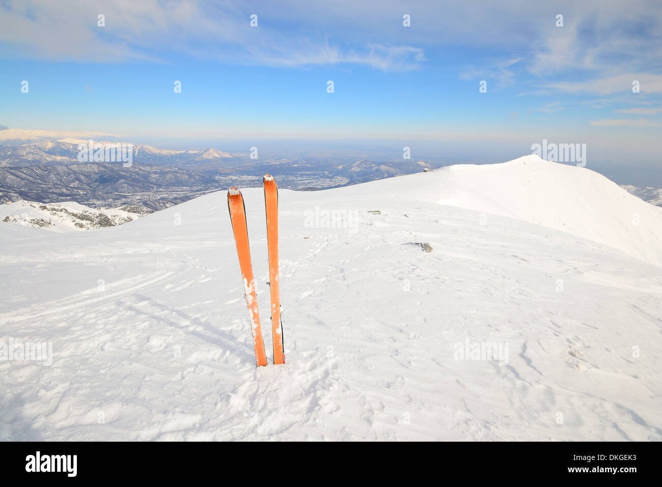 On the mountain summit, tour ski and back country skiing equipment with avalanche safety tools Stock Photo