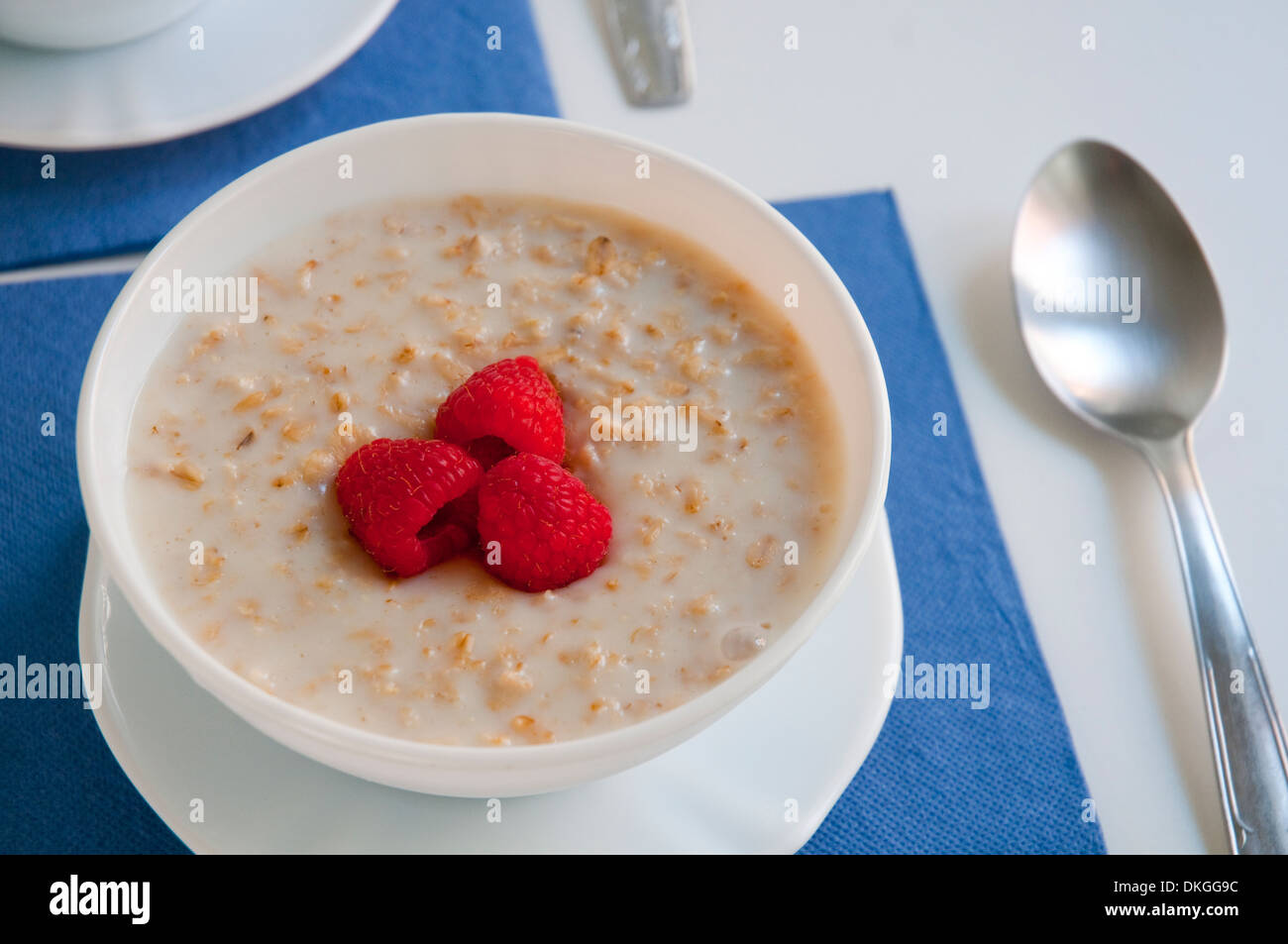 Porridge with raspberries. Close view. Stock Photo