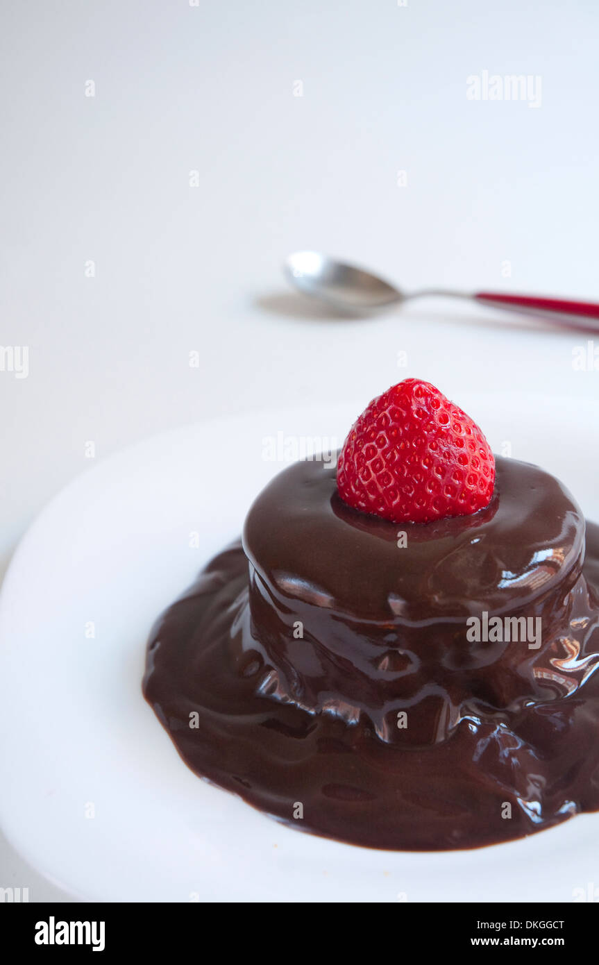 Dessert: chocolate cake with strawberry. Close view. Stock Photo