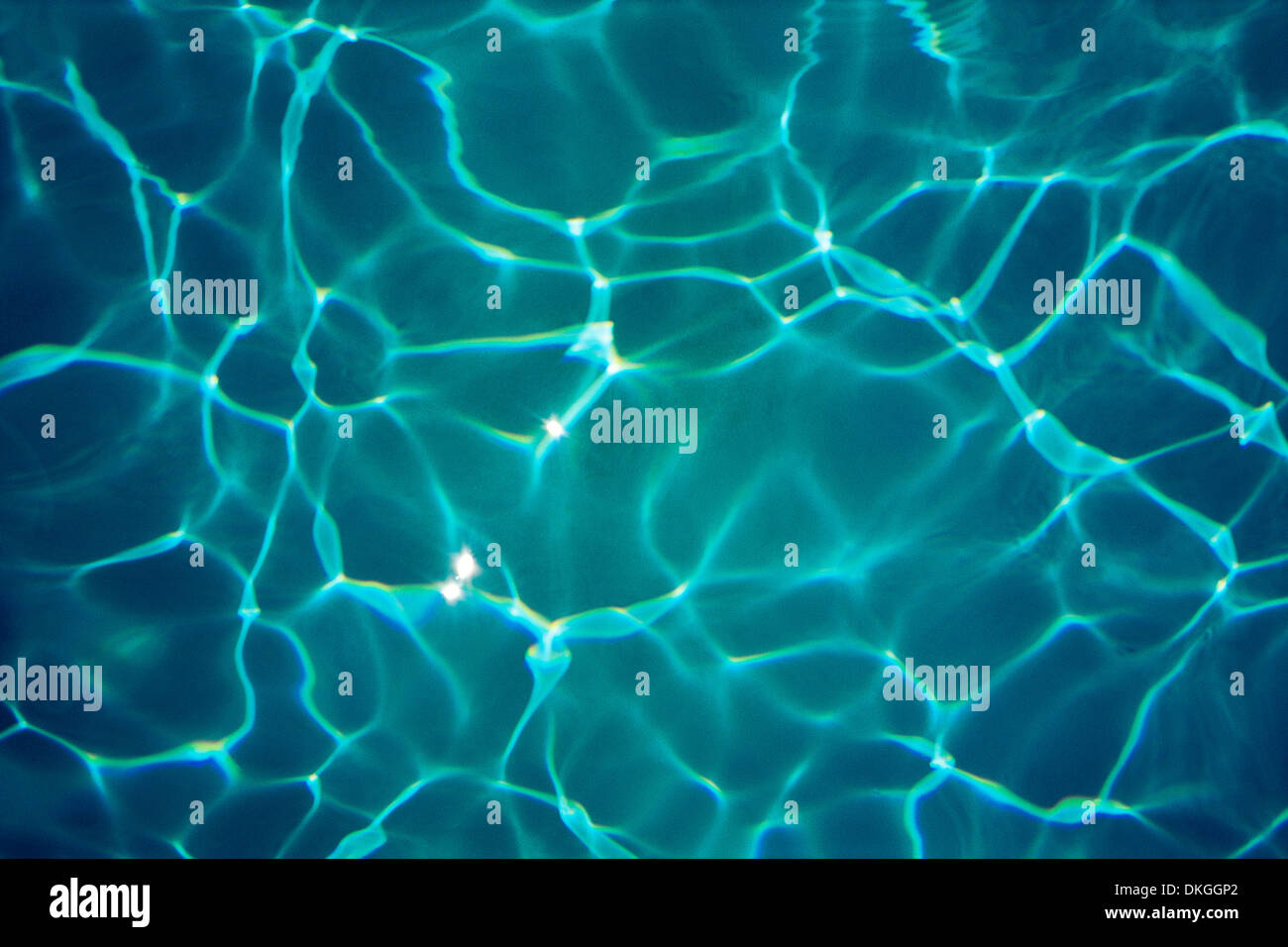 Light rays dancing in swimming pool Stock Photo - Alamy