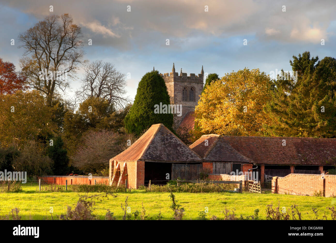 The Warwickshire village of Aston Cantlow, showing old church and barns, England. Stock Photo