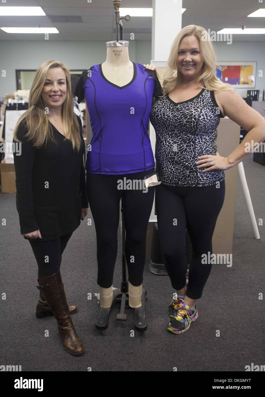 Los Angeles, California, USA. 25th Nov, 2013. Stacy Goldstein of Lola Getts  Active, poses with a plus-sized models. Goldstein is making yoga pants and  other sports apparel for bigger women. © Ringo