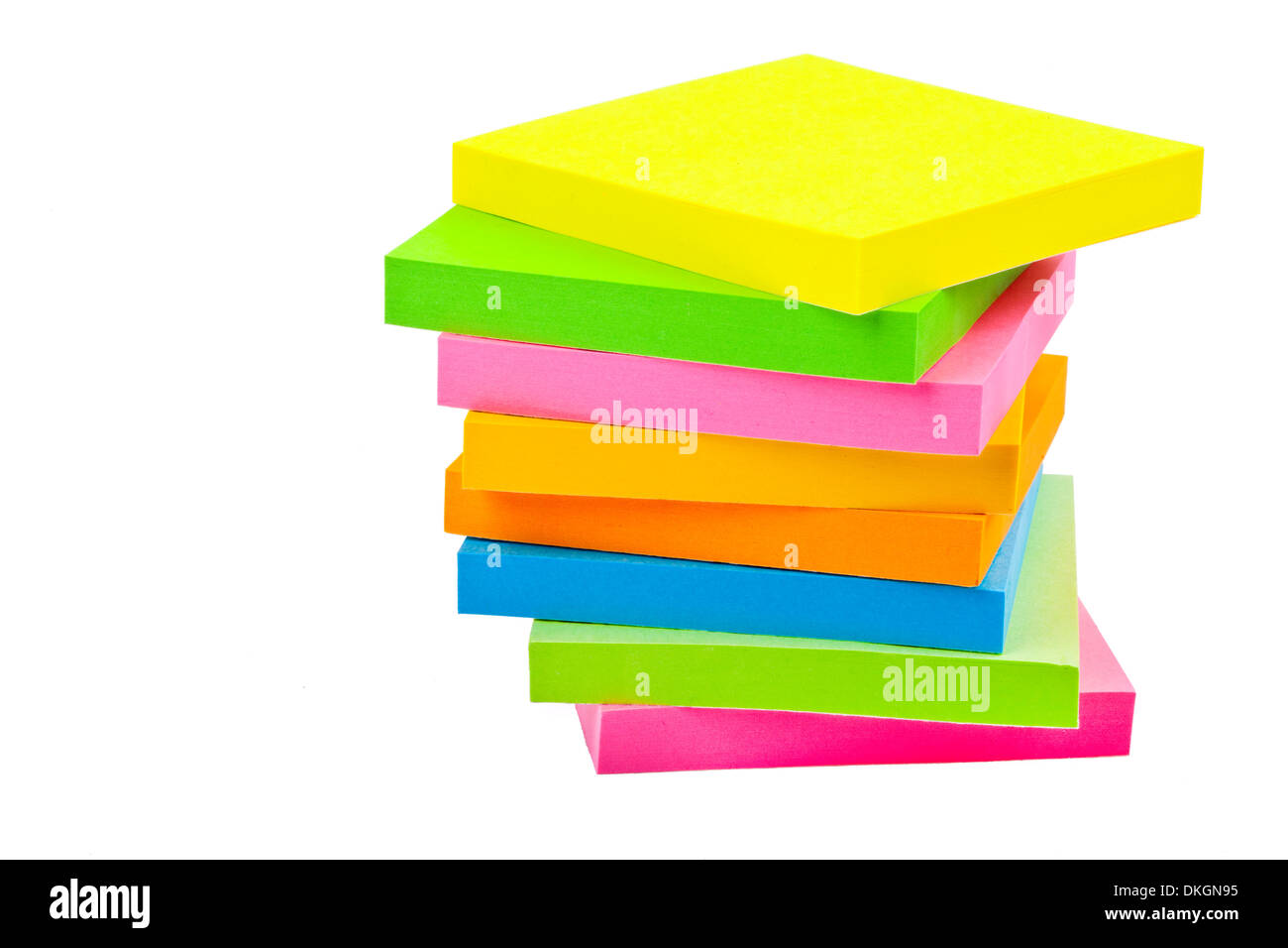 Stack of Sticky Note Pads over a white background. Stock Photo