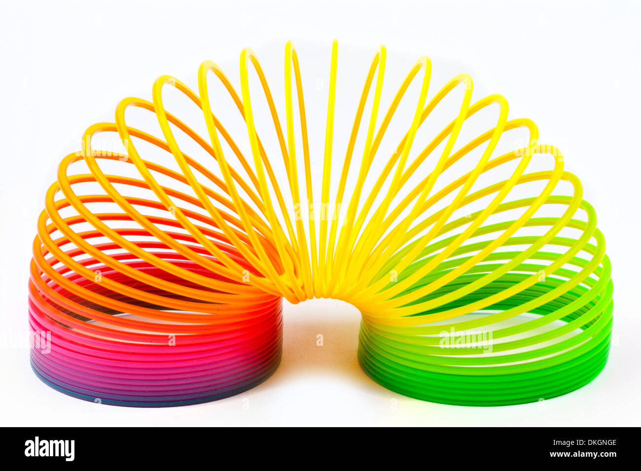 Slinky Toy isolated over a plain white background. Stock Photo