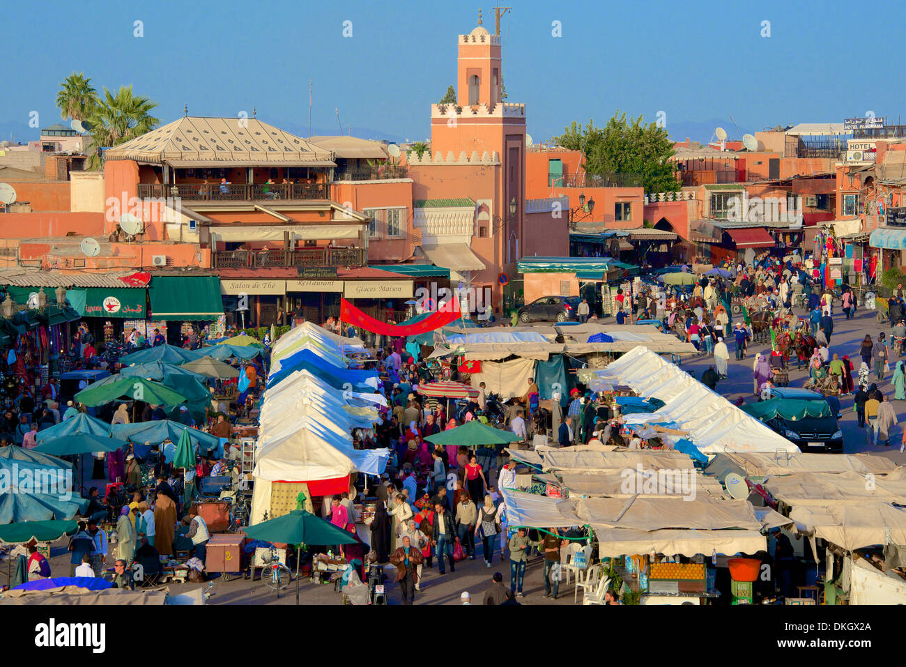 Restaurants, terraces, Kharbouch mosque and minaret, Jemaa-el-Fna Square, Marrakech, Morocco, North Africa, Africa Stock Photo