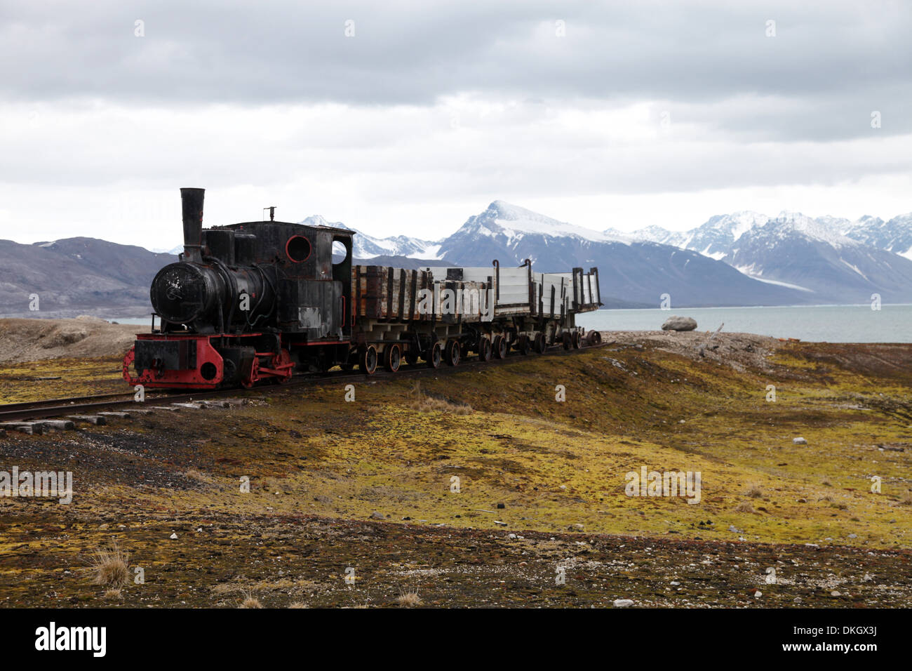 Coal trucks and locomotive preserved as a monument at Ny Alesund, Svalbard, Norway, Scandinavia, Europe Stock Photo