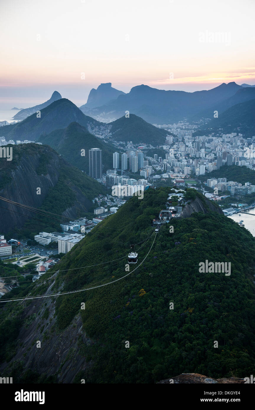 View from the Sugarloaf and the famous cable car at sunset, Rio de Janeiro, Brazil, South America Stock Photo