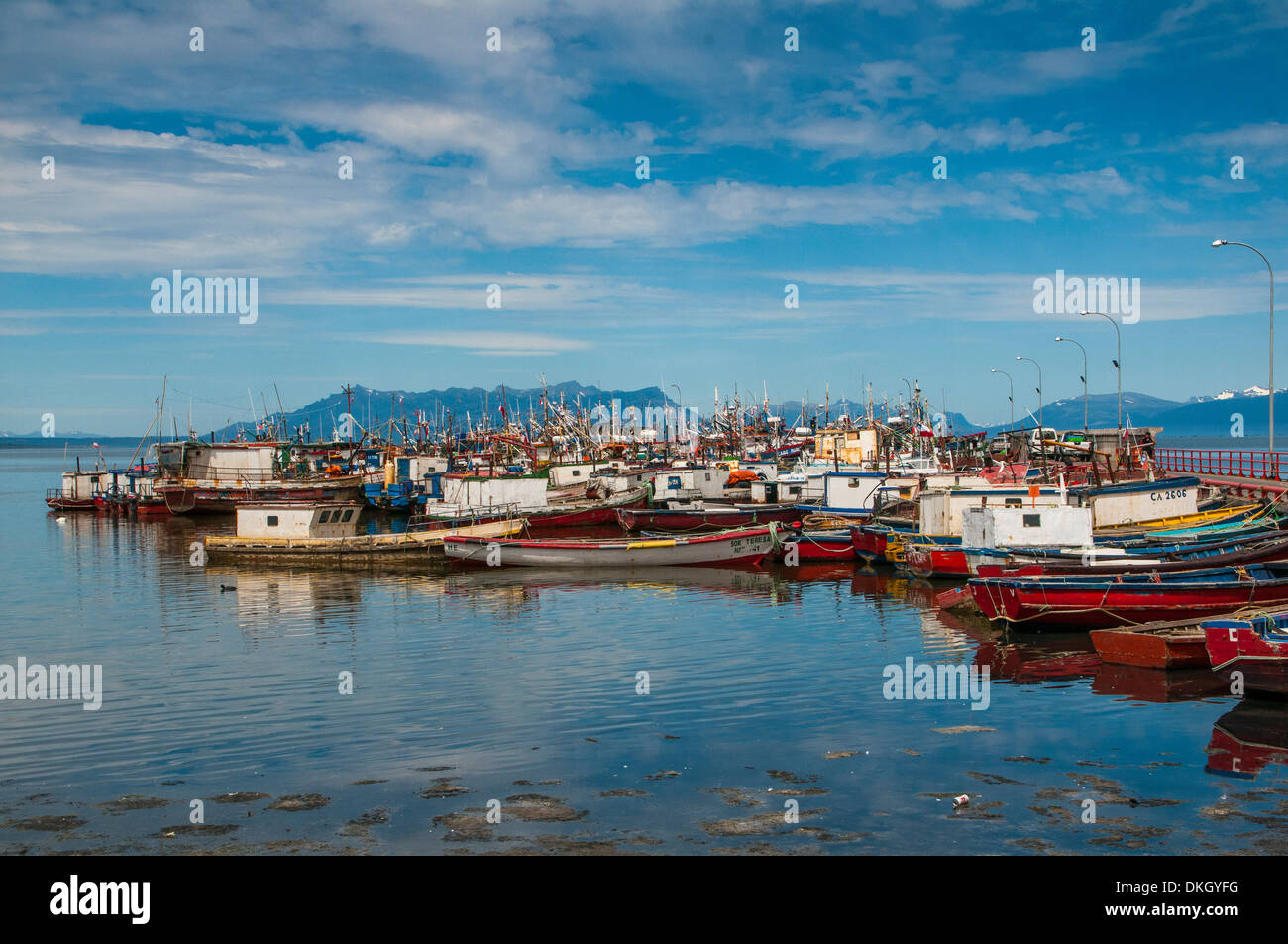 Many little boats in the harbour of Puerto Natales, Patagonia, Chile, South America Stock Photo