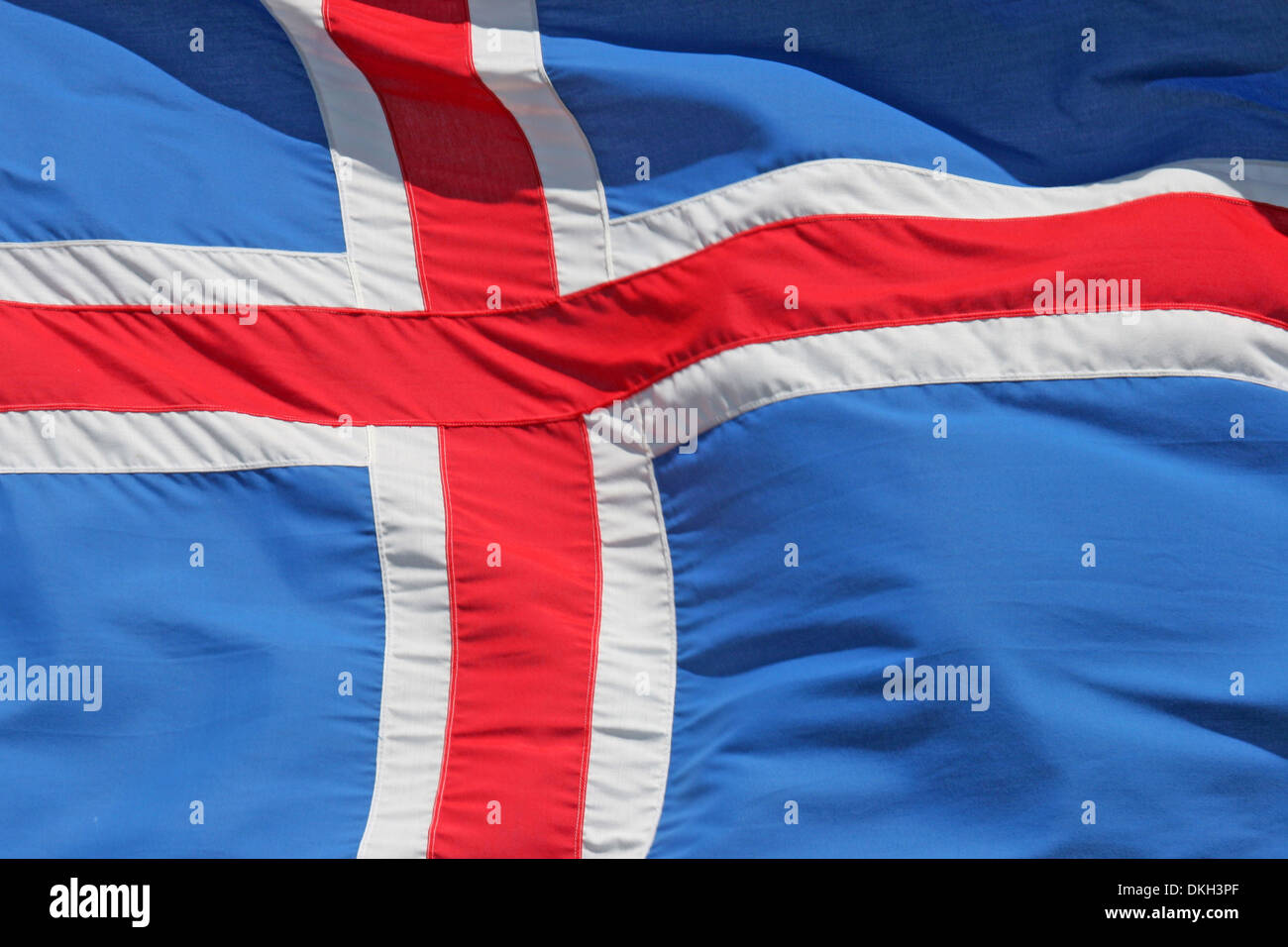 Close up of the National flag of Iceland in Scandinavia, Europe. With a red & white cross over a blue background. Stock Photo