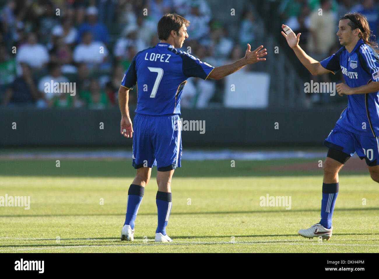 28 June 2009: Claudio Lopez #7 of the Kansas City Wizards is congratulated by Santiago Hirsig #10 after his goal in the 80th minute. Santos Laguna defeated the Kansas City Wizards 3-1 during their SuperLiga match at CommunityAmerica Ballpark in Kansas City, KS. (Credit Image: © Tyson Hofsommer/Southcreek Global/ZUMApress.com) Stock Photo