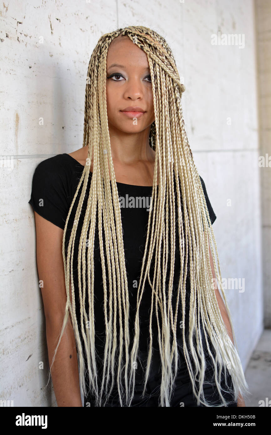 Portrait of music producer wearing long blond hair extensions at Fashion Week at Lincoln Center in New York City Stock Photo