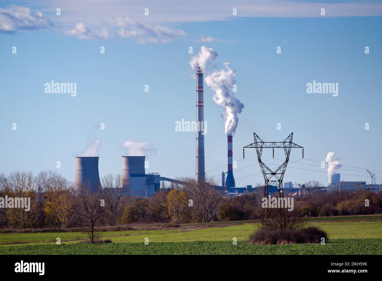 Maritsa East 3 thermal power plant and transmission tower over green