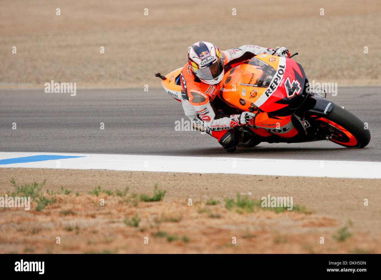 July 05, 2009 - Monterey, California, USA - 05 July 2009: Andrea Dovizioso, of Forlimpopoli, Italy, rides the #4 motorcycle for the Respol Honda Team Honda during MotoGP warm-up at the  Mazda Raceway Laguna Seca, in Monterey, Calif. MotoGP's 8th race is set to take place on today, July 5, 2009 at 14:00 PST prior to making its next stop  in Germany. (Credit Image: © Konsta Goumenidi Stock Photo