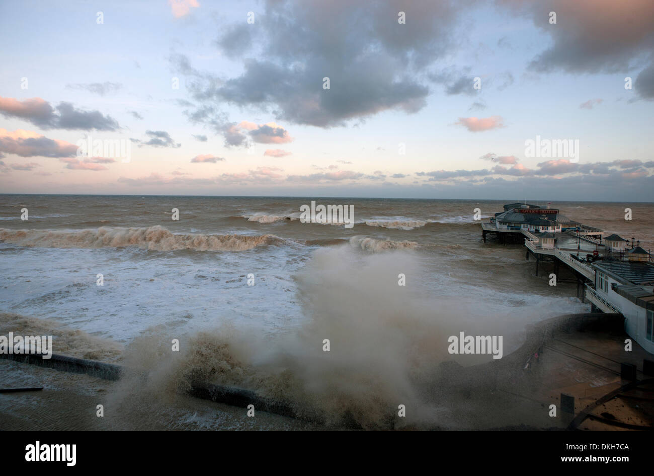 Cromer, Norfolk, UK. 6th December 2013. Waters from a spring high tide at 8.30am inundate the pier at Cromer in Norfolk UK in the strongest storm surge seen since 1953 Credit:  Tim James/The Gray Gallery/Alamy Live News Stock Photo