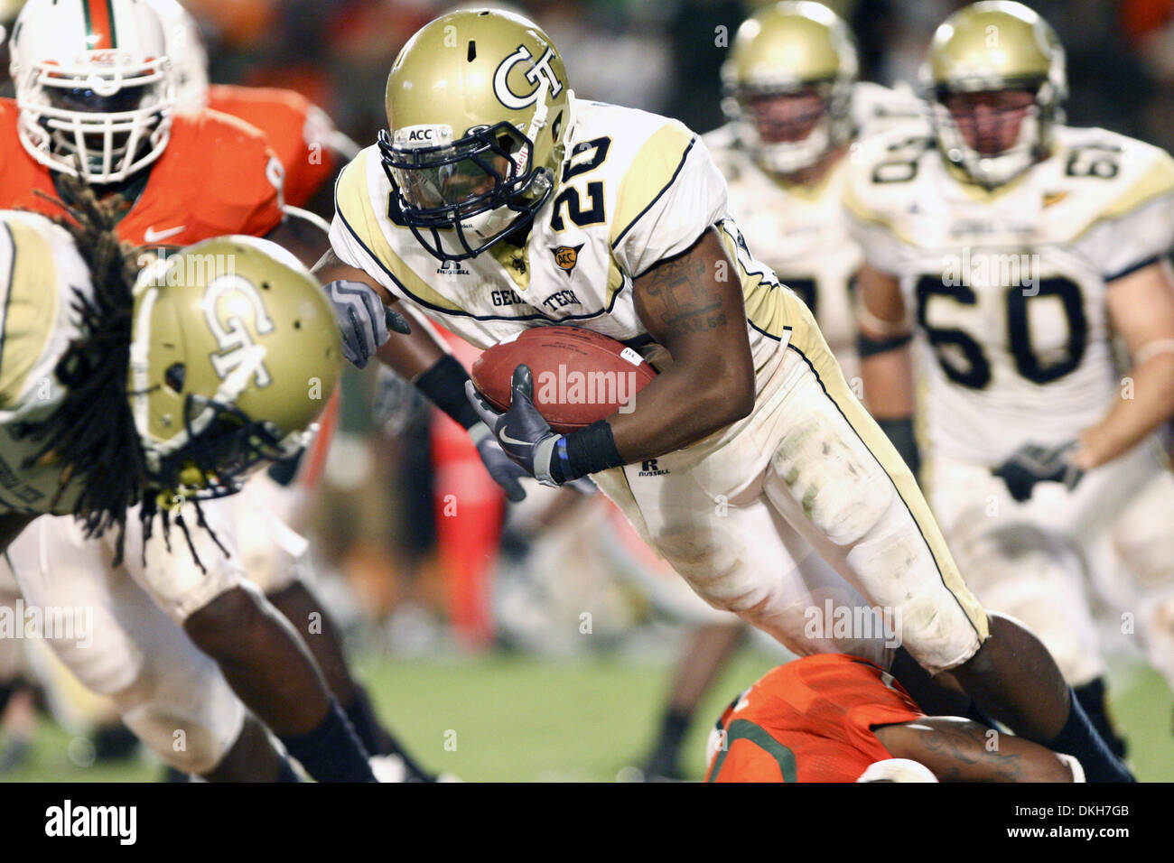 Tech cornerback Dominique Reese (26) is tackeld by Miami