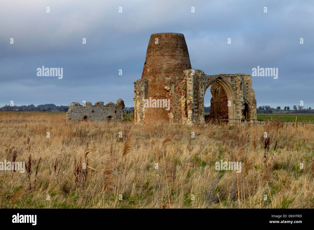 The remains of the 14th century St. Benet's Abbey and the windmill built within its walls near Ludham, Norfolk, England, UK Stock Photo