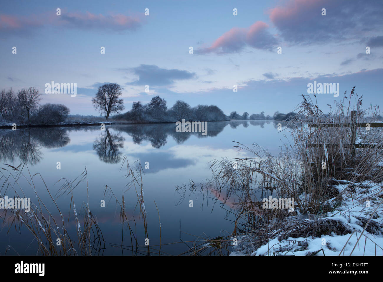 A mirror calm River Yare on a winter morning at Strumpshaw Fen, Norfolk, England, United Kingdom, Europe Stock Photo