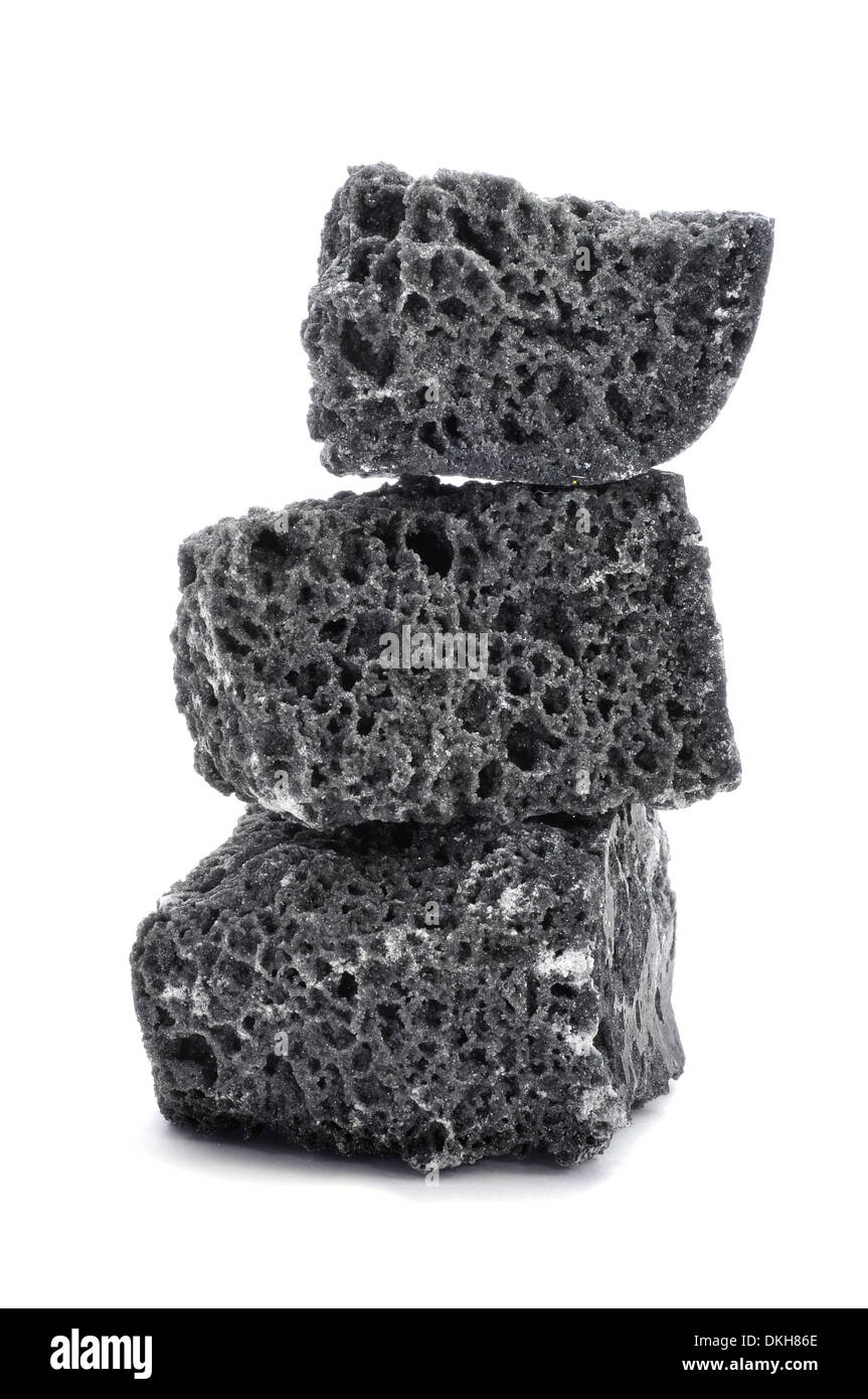 some lumps of candy coal on a white background Stock Photo - Alamy