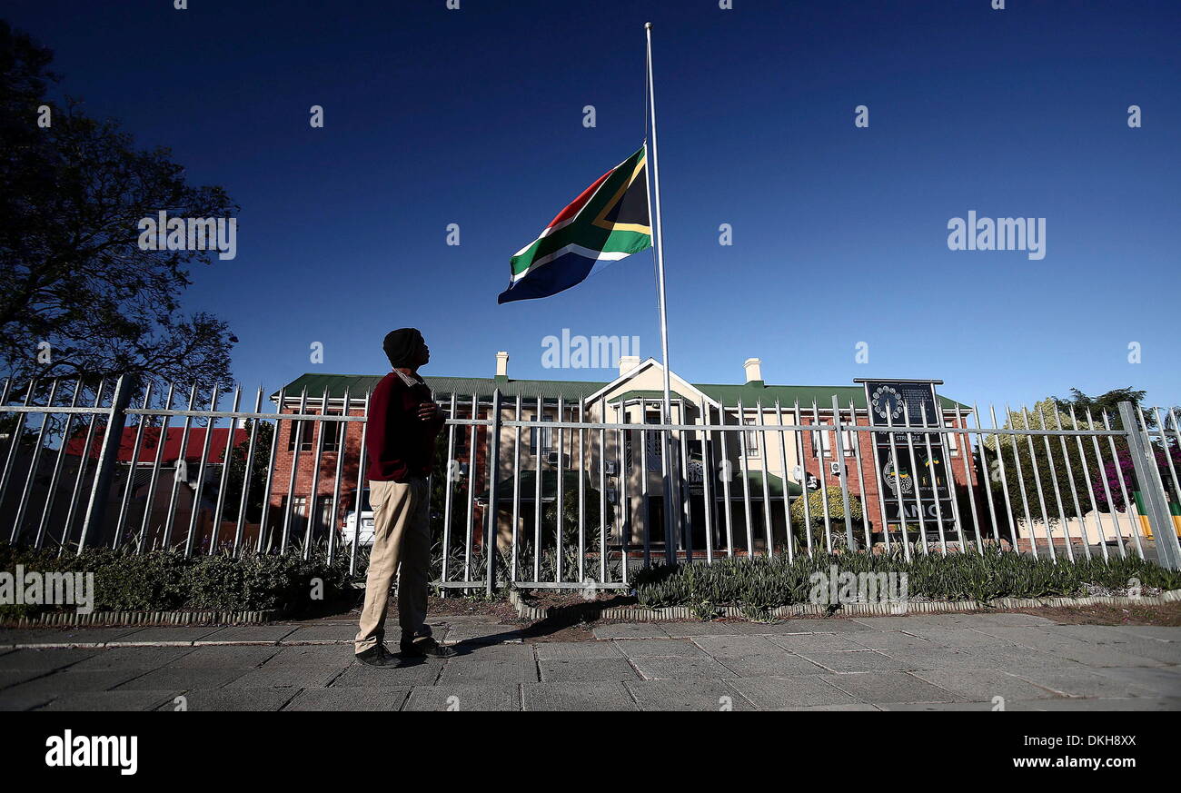 Johannesburg, South Africa. 6th December 2013.  The South African flag flies half mast on December 6, 2013, in Johannesburg, South Africa. The Father of the Nation, Nelson Mandela, Tata Madiba, passed away quietly on the evening of December 5, 2013 at his home in Houghton with family. (Photo by Gallo Images / Daily Dispatch / Mark Andrews) Credit:  Gallo images/Alamy Live News Stock Photo