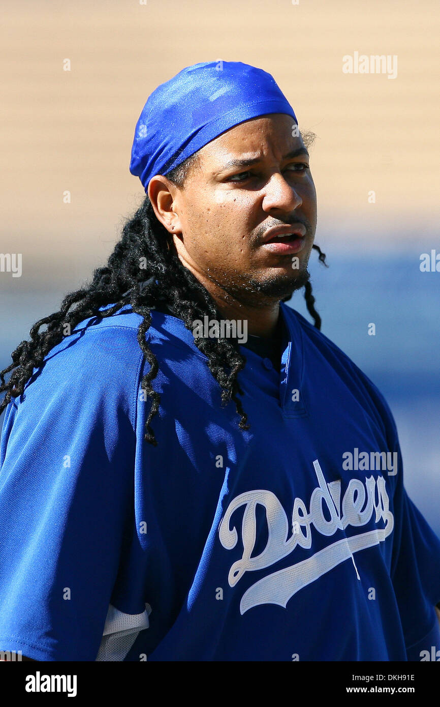 Los Angeles Dodgers Manny Ramirez adjusts his helmet as the takes batting  practice prior to the first NCLS game with the Philadelphia Phillies at  Citizens Bank Park in Philadelphia on October 9