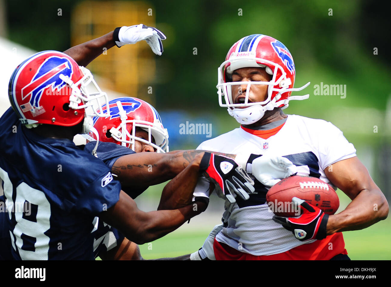 Buffalo Bills receiver Lee Evans (83) pulls in the catch over defensive backs Leodis McKelvin and Reggie Corner during training camp at St. John Fisher College in Rochester, NY. (Credit Image: © Michael Johnson/Southcreek Global/ZUMApress.com) Stock Photo